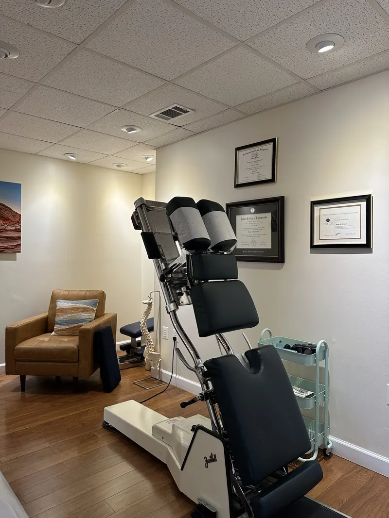 A treatment room with a roller table at Reston Healing Center